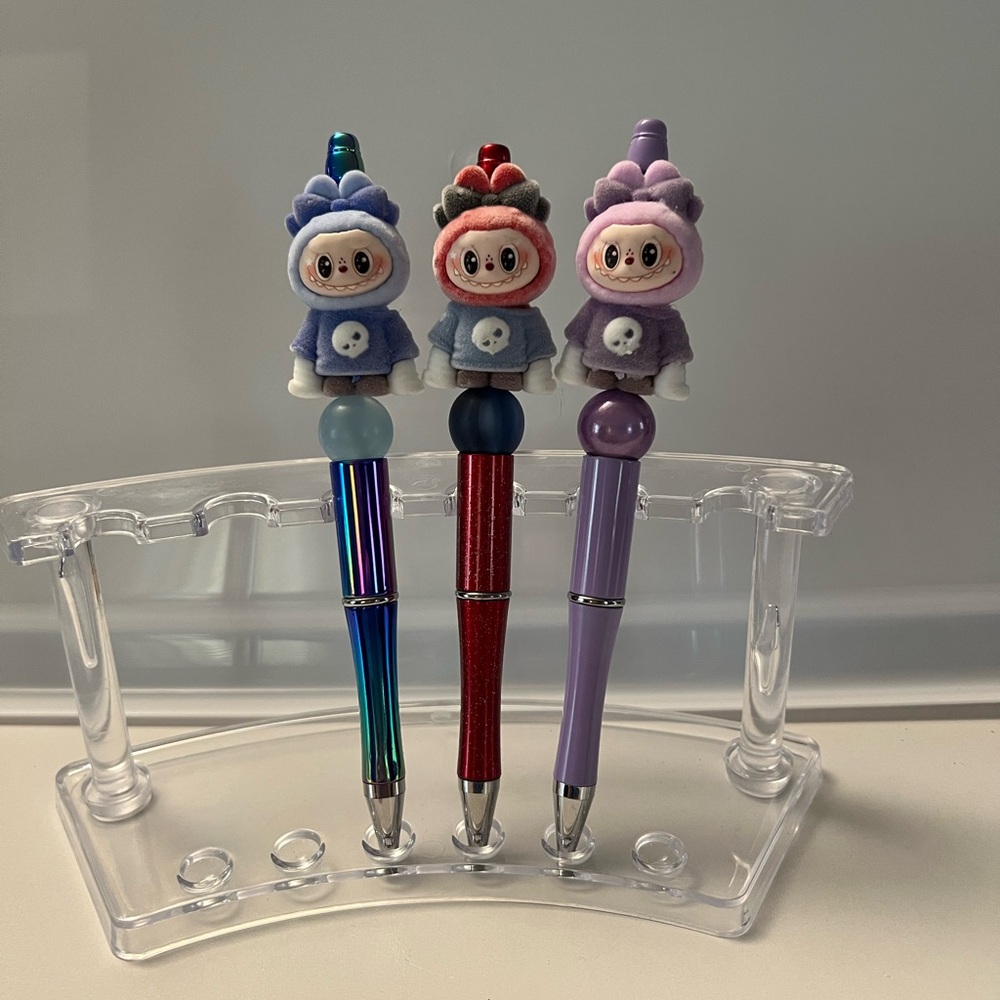 Three Labubu pens